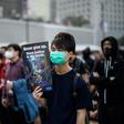 A protester holds a poster during a December 2019 rally in Hong Kong to show support for the Uighur minority in China