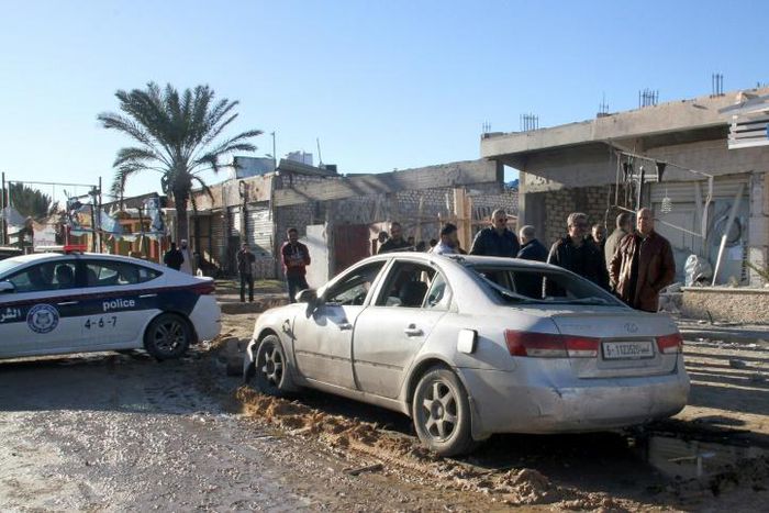 An air strike in Zawiya near the Libyan capital Tripoli hit a pharmacy, a bakery and cars parked on the street, the mayor of the town said