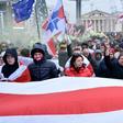 Belarusian protesters march in the capital Minsk against the prospect of closer ties with Russia