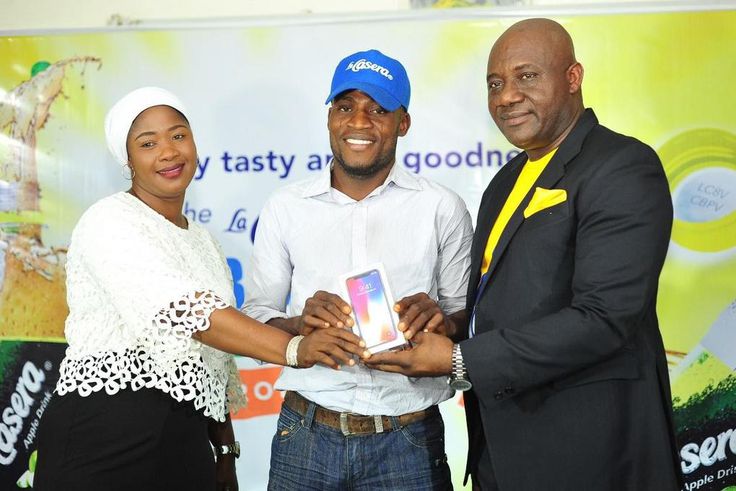 L-R: La Casera Dealer in Ibadan, Alhaja Adenekan Kudirat Wunmi of Dalec Store; iPhone X star prize winner, Oladapo Tunde Joshua and the Managing Director, The La Casera Company, Chinedum Okereke; at the Ibadan Grand Draw of the La Casera Refresh & Conn...