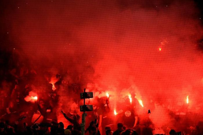 Saint-Etienne's supporters set off flares and let of fireworks during their defeat to Paris Saint-Germain
