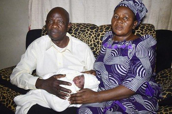 Mr Christopher Osiebo and wife Dorcas with baby Emmanuel (The Nation)