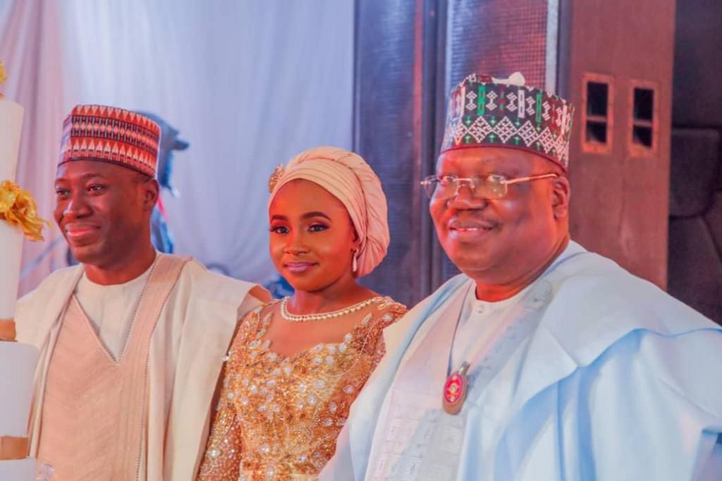 The bridegroom and son of the Senate President, Ibrahim Ahmad Lawan (left); the bride, Amani Umar, and Father of the bridegroom and President of the Senate, Ahmad Ibrahim Lawan, during the dinner on eve of the wedding fatiha of the Senate President’s s...