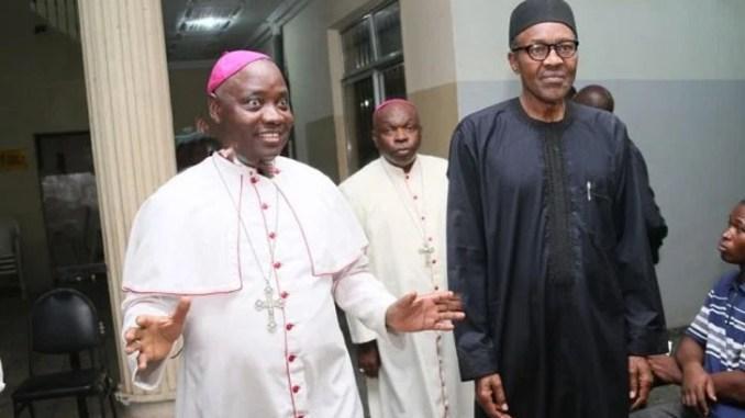 Buhari rejoices with Kaigama as he replaces Onaiyekan as Archbishop of Abuja. [sundiatapost]