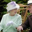 Britain's Queen Elizabeth II and Prince Philip, who is undergoing hospital treatment for what Buckingham Palace described as a "pre-existing condition"