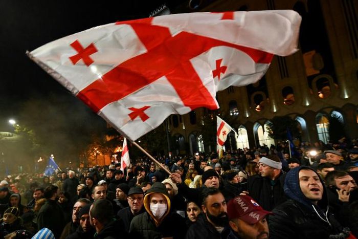 Opposition supporters have staged a series of mass rallies in the capital Tbilisi after the ruling party voted down legislation to hold next year's elections under a new proportional voting system