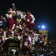 The protectors serve as human armour during the procession through Manila of the historic statue of Jesus Christ