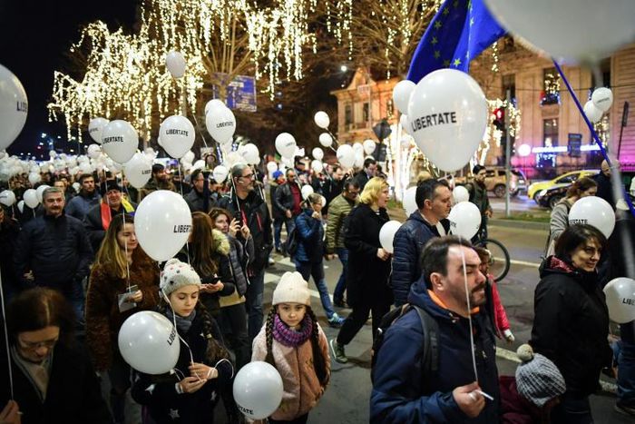 Hundreds of balloons were released in memory of the more than a thousand people3 killed during the revolution