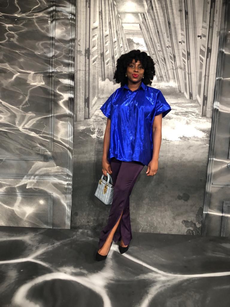 Chimamanda wears Orange Culture by Bayo Oke Lawal at a reception held for Creative Director of Dior, Maria Grazia Chiuri in honor of her Legion of Honor Award by the French President earlier in May.