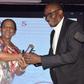 Globacom’s National Commercial Coordinator, Mr. Yomi Ogunbamowo, receiving  the Platinum Award of Nigeria’s Outstanding and Most Innovative Entrepreneur conferred on Globacom Chairman, Dr. Mike Adenuga, Jr., from the Publisher, Nigerian Tribune titles,...