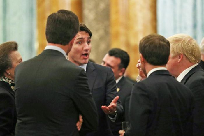 Canadian Prime Minister Justin Trudeau, (3rdL) speaks with and Britain's Prime Minister Boris Johnson (R), France's President Emmanuel Macron (2ndR), NATO Secretary General Jens Stoltenberg (2ndL) and Britain's Princess Anne at Buckingham Palace
