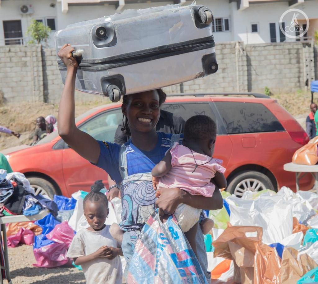 COZA hosts massive charity event, donates clothes and food to thousands in Abuja