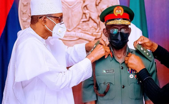 Former President Muhammadu Buhari decorated the Chief of Defence Staff, Gen. Lucky Irabor, with his new rank. [Presidency]
