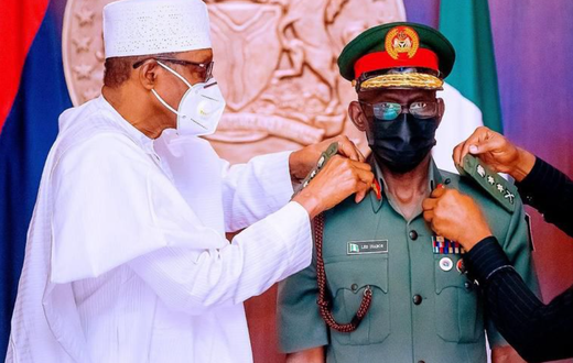 Former President Muhammadu Buhari decorated the Chief of Defence Staff, Gen. Lucky Irabor, with his new rank. [Presidency]