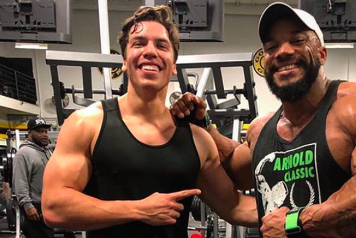 Joseph Baena and Sergio Oliva Jr. Pose in Gym Pic