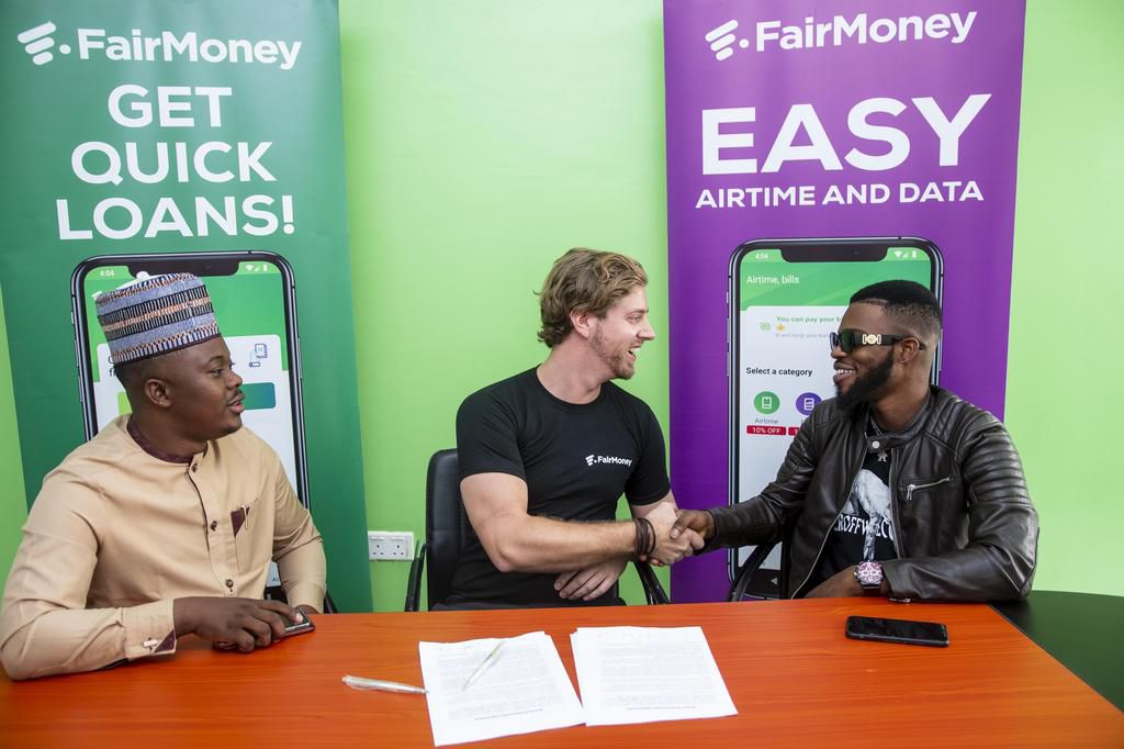 General Manager Nigeria, FairMoney, Julian Flosbach (middle), in a warm handshake with Comedian Broda Shaggi, Animashaun Samuel Perry, at the unveiling of the comedian as FairMoney ambassador in Lagos...recently. With them is the Comedian’s Manager Olu...