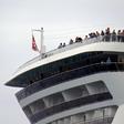 Passengers remain onboard the MSC Meraviglia cruise ship in Cozumel, Mexico, awaiting a decision on whether they can disembark