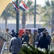 Egyptian honour guards carry the coffin of former president Hosni Mubarak before his funeral ceremony at Cairo's Mosheer Tantawy mosque in Cairo
