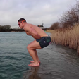 Watch This Bodybuilder Go Ice Swimming