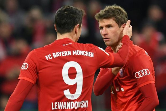 Bayern Munich's German forward Thomas Mueller (R) enjoys a key partnership with Poland striker Robert Lewandowski