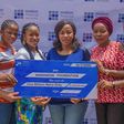 A cross section of the Industrious women under the MamaMoni Empowerment Foundation during the presentation of the Rosabon one million naira Grant cheque to MamaMoni Empowerment Foundation recently.