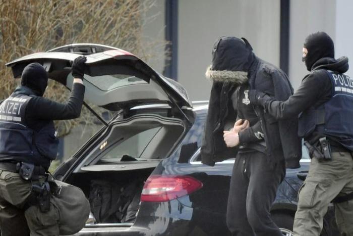 Prosecutors said Friday they had launched early morning raids to determine whether the suspects already had weapons or other supplies that could be used in an attack