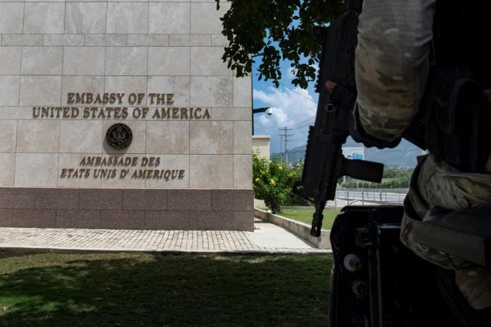 Haitian security personnel stand guard outside the US embassy in Port-au-Prince in April 2019