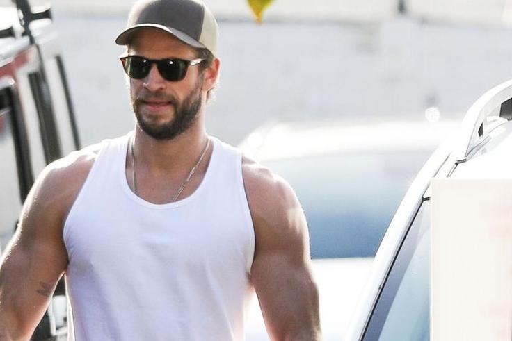 Liam Hemsworth's Biceps Could Rival Thor's Muscles