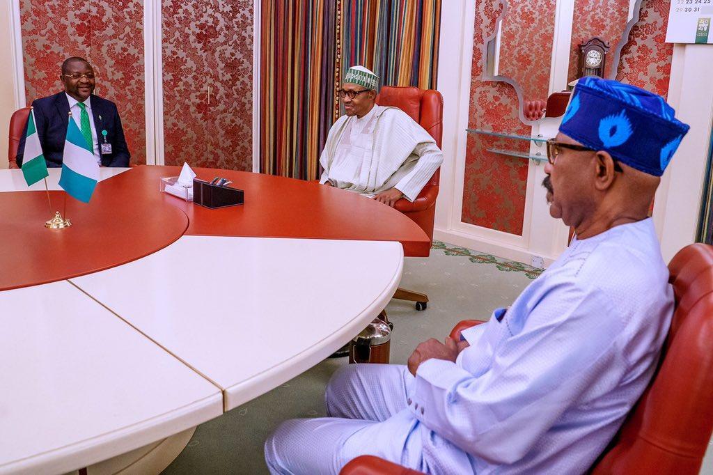 President Muhammadu Buhari (M), Minister of Sports and Youth Development, Sunday Dare (R) and Minister of Health state, Olorunnimbe Mamora. [Twitter/@NGRPresident]