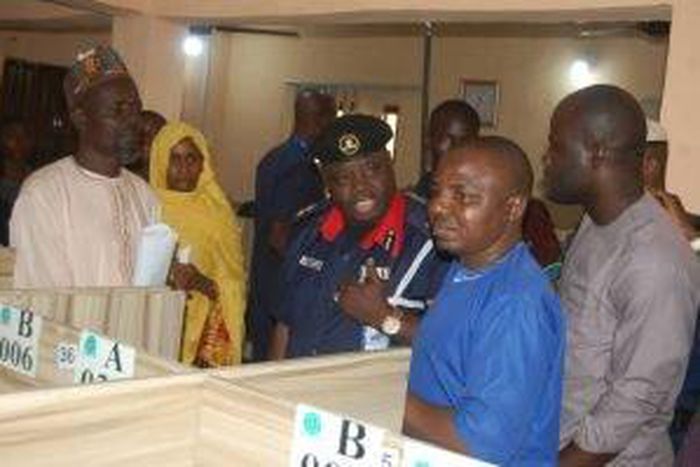 In the middle is State Commandant NSCDC Kaduna exchanging views with the official of JAMB in Kaduna during the monitoring of UTME in Kaduna on Tuesday. (NAN)