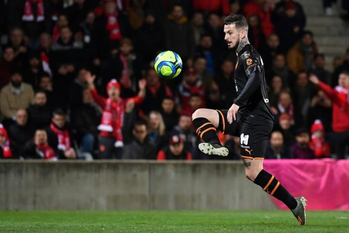 Benedetto lobs home the second of his three goals