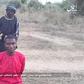 Daciya Dalep, a university student, on his knees moments before he was executed by a Boko Haram terrorist [Amaq News]