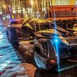 This handout photo from Russian Interior Ministry taken on February 22, 2020 shows Russian traffic policemen standing next to a vehicle in Moscow that bears a striking resemblance to the "Batmobile"