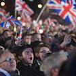 Men and women of all ages from around the country, many decked out in the red, white and blue colours of the Union Jack flag, hugged and kissed, while fireworks were set off into the night sky