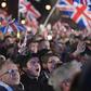 Men and women of all ages from around the country, many decked out in the red, white and blue colours of the Union Jack flag, hugged and kissed, while fireworks were set off into the night sky