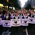 Relatives of Basque prisoners hold banners reading "Basques prisoners and fugitives back home" during a protest in the northern Spanish city of Bilbao to demand the transfer of ETA prisoners to jails near their homes