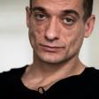 Russian artist Pyotr Pavlensky poses during a press interview with AFP at his lawyer's office in Paris on February 14, 2020.Pavlensky was placed in custody on February 15, 2020 as part of an investigation for violence on December 31, 2019.
Emmanuel Mac...