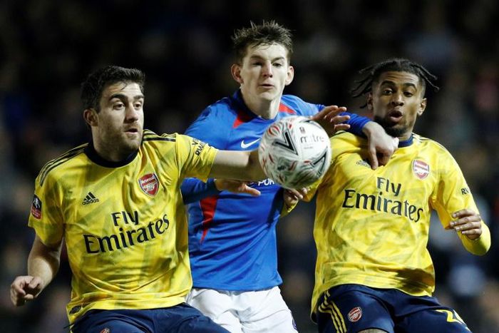 Won't stay if unwanted - Arsenal defender Sokratis Papastathopoulos (L) in FA Cup action against Portsmouth