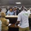 Nigerian official screening inbound passengers for Coronavirus at the airport. [Punch]