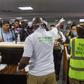 Nigerian official screening inbound passengers for Coronavirus at the airport. [Punch]