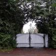A shielded gate at the entrance of Meghan and Prince Harry's temporary home in North Saanich, Canada