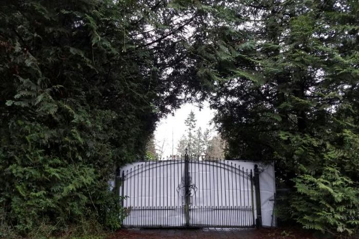 A shielded gate at the entrance of Meghan and Prince Harry's temporary home in North Saanich, Canada