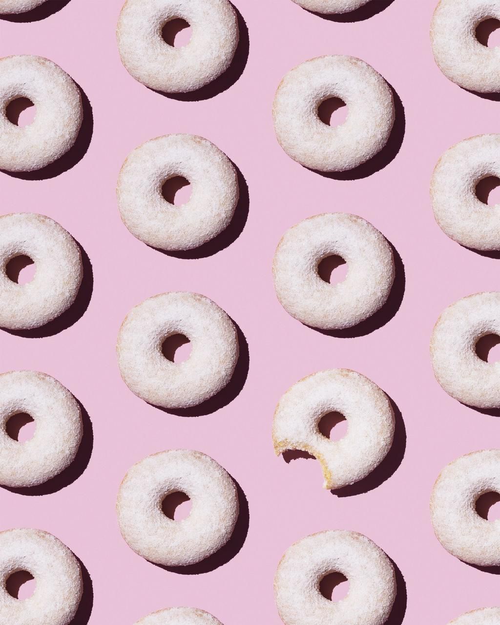 Doughnuts on pink background