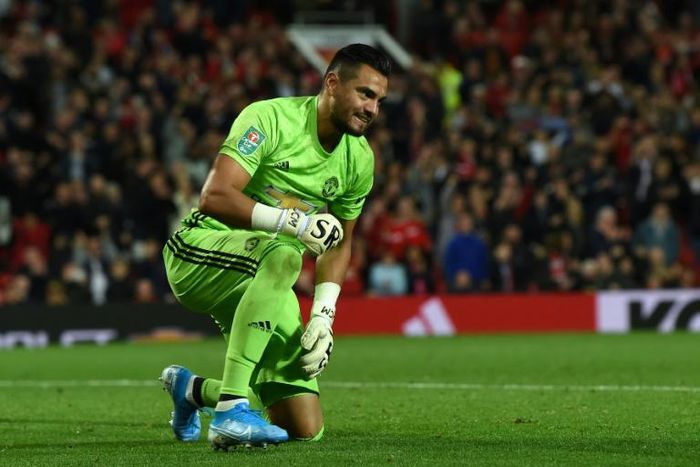 Manchester United goalkeeper Sergio Romero escaped unhurt from a car crash on Monday