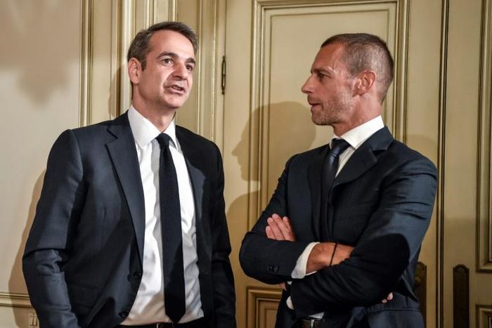 Greek Prime Minister Kyriakos Mitsotakis (L) with UEFA president Aleskander Ceferin