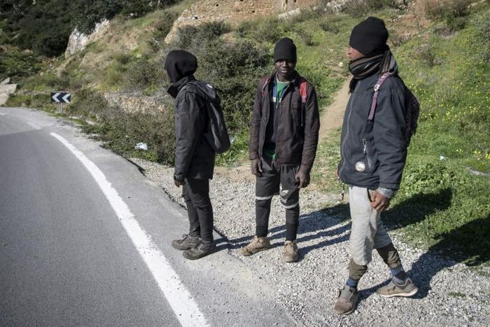 African migrants Mustapha (C) and his travel companions Ahmed and Omar are hoping to enter the Spanish enclave of Ceuta from Morocco but a clampdown is making the crossing difficult
