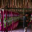 Workers spend months using a traditional method to craft the sticks -- some as tall as two metres (6.5 feet)