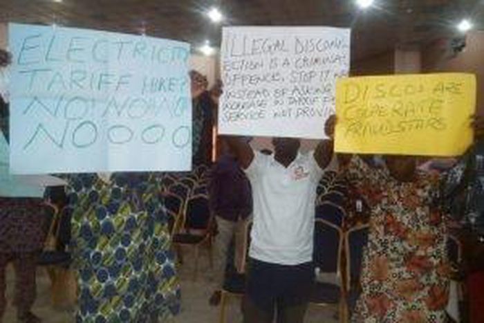 Electricity consumers protesting against the proposed tariff hike by Ikeja Electric during a stakeholders consultative forum on Monday in Ikeja. [NAN]
