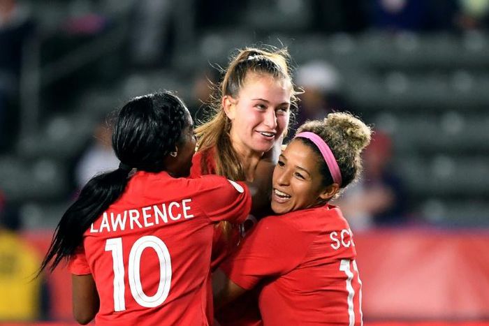 Jordyn Huitema celebrates her goal with Canada teammates Ashley Lawrence and Desiree Scott as Canada's women footballers book their Tokyo Olympic berth with a 1-0 victory over Costa Rica in the semi-finals of the CONCACAF regional qualifier