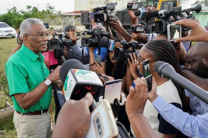 President David Granger, pictured after voting on March 2, 2020, has been urged to avoid an "unconstitutional" transition